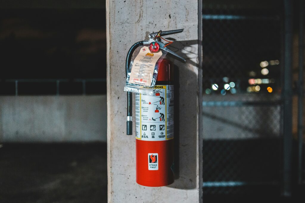 Fire extinguisher inspected for Arvada rental property safety compliance